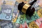 Judge's gavel on Australian dollars